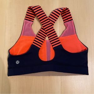 LULULEMON small/medium sports bra. Great support. Bright orange and navy.